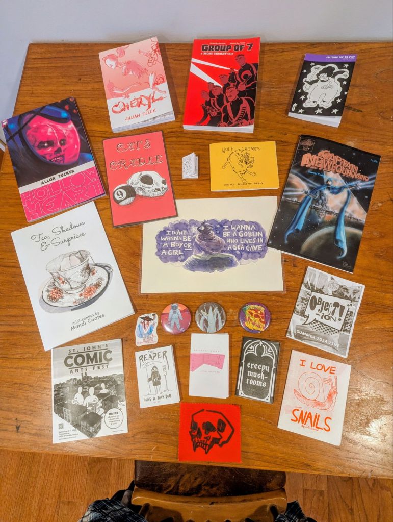 A table full of comics & zines!